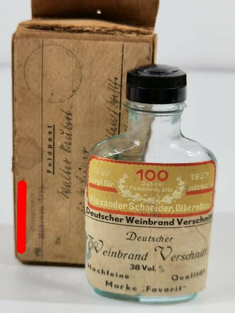 Leere Flasche " Deutscher Weinbrand Verschnitt" im Feldpostpaket , Absender NSDAP Ortsgruppe Rübenau