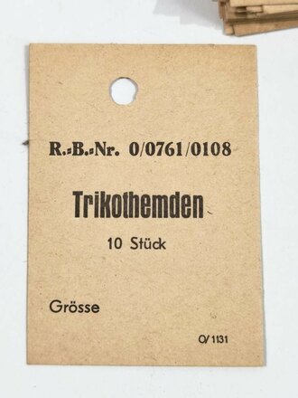 Pappetikett " Trikothemden 10 Stück" Restbestand aus Uniformfabrik. Sie erhalten 1 ( ein ) Stück