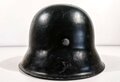 Stahlhelm Modell 1942 mit originalem Innenfutter, Zugband und Nieten. Schwarz überlackierte EF 68 Glocke