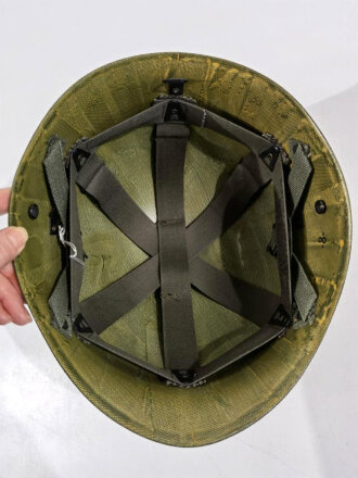 U.S. Army Liner parachutists helmet, dated 1983. Including a sweatband and cotton chinstrap. Unused