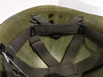 U.S. Army Liner parachutists helmet, dated 1983. Including a sweatband and cotton chinstrap. Unused