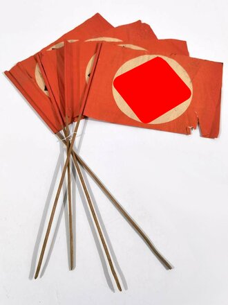 III.Reich, 4 Papierfähnchen an Holzstab, je 20 x 29cm, Gesamtlänge 55cm, alle mehr oder minder beschädigt