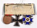 Ordenspange eines tapferen Bayern. Der Militär Verdienst Orden mit Emailleschaden im unteren Kreuzarm vorder- und rückseitig das Medaillon aus gold
