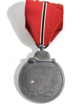 Medaille " Winterschlacht im Osten" mit Hersteller 60 im Bandring für Katz & Deyle, Pforzheim. Band oben vernäht