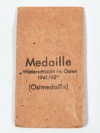 Medaille " Winterschlacht im Osten" mit Hersteller 76 im Bandring für Ernst L. Müller, Pforzheim mit passender Verleihungstüte. Seltener zu finden