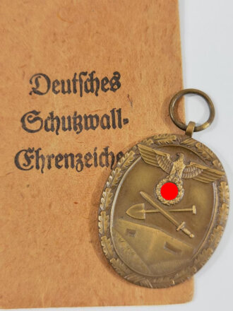 Deutsches Schutzwall- Ehrenzeichen mit Verleihungstüte " E. Schmidhäuser, Pforzheim "