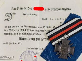 Ehrenkreuz für Frontkämpfer mit Hersteller O&B, mit Band und Verleihungstüte, dazu die Urkunde eines Bautechniker von Frankfurt a.M.