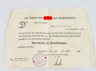 Ehrenkreuz für Frontkämpfer mit Hersteller O&B, mit Band und Verleihungstüte, dazu die Urkunde eines Bautechniker von Frankfurt a.M.