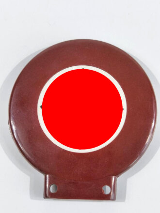 Fahrrademblem schwarzlackiertes Hakenkreuz auf weiß in rotbraunem Preßstoffrahmen. Ungebrauchtes Stück in sehr gutem Zustand. Höhe insgesamt 80mm