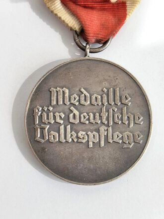 Medaille für " Deutsche Volkspflege " am langen Bandabschnitt, Buntmetall