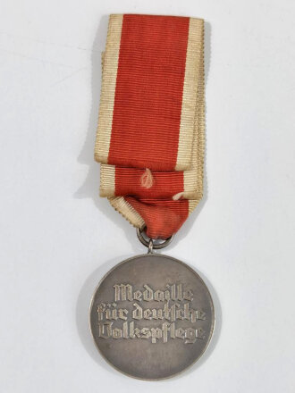 Medaille für " Deutsche Volkspflege " am langen Bandabschnitt, Buntmetall