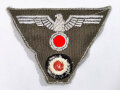 Feldmützenadler ( Hoheitsabzeichen für Feldmütze mit Kokarde )  für Mannschaften des Heeres, spätes Modell. Sie erhalten ein ( 1 ) Stück aus der originalen Umverpackung