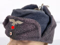 Luftwaffe Winterpelzmütze in gutem Zustand. Die Effekten originalvernäht, datiert 1942