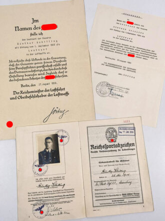 Luftwaffe, Urkundengruppe eines Leutnant der Reserve, große Anstellungsurkunde als Leutnant der Luftwaffe, gedruckte Unterschrift von Hermann Göring, dazu das Urkundenheft zum Reichssportabzeichen in Bronze