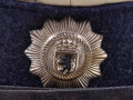 Deutschland nach 1945, Schirmmütze Polizei Berlin, Kopfgrösse 58. Stark getragenes, ungereinigtes Stück