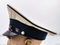 Deutschland nach 1945, Schirmmütze Polizei Berlin, Kopfgrösse 58. Stark getragenes, ungereinigtes Stück