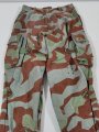 Bundeswehr Tarnhose 1.Modell ( 1956 ) Getragenes Stück mit diversen Flickstellen, Bundweite: 86 cm