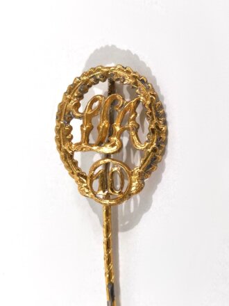 Miniatur, Bayerisches Sport- Leistungs- Abzeichen in Gold mit Wiederholungszahl " 10 " an Nadel, Größe 20mm