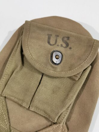 U.S. 1943 dated T handle shovel cover with rigger attached magazine pouch.