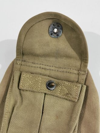 U.S. 1943 dated T handle shovel cover with rigger attached magazine pouch.