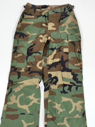 U.S. 1988 dated woodland camo Combat trousers, size small...