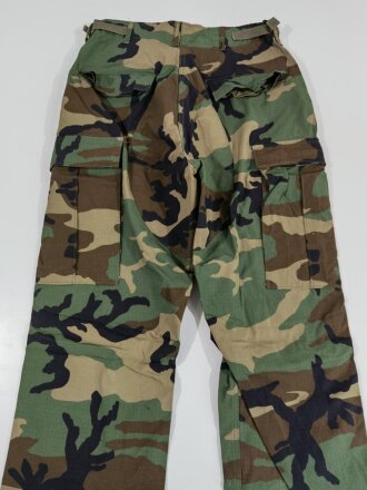 U.S. 1988 dated woodland camo Combat trousers, size small xlong. Unused