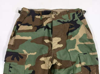 U.S. 1988 dated woodland camo Combat trousers, size small xlong. Unused