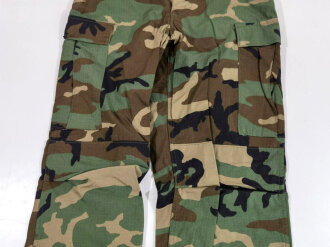 U.S. 1988 dated woodland camo Combat trousers, size small xlong. Unused