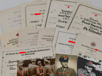 Große Urkundengruppe eines Angehörigen Panzer Regiment , Urkunden gefalten und teils gelocht, sonst gut