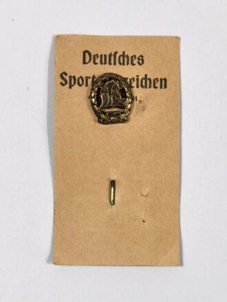 Deutschland nach 1945, Deutsches Reichssportabzeichen DRL in Bronze als 16 mm Miniatur mit Pappkarton
