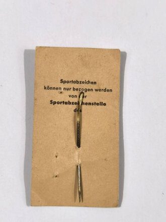 Deutschland nach 1945, Deutsches Reichssportabzeichen DRL in Bronze als 16 mm Miniatur mit Pappkarton