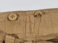Luftwaffe Tropenhose. Leicht getragenes Kammerstück mit Reparaturstelle. Die Beintasche aus andersfarbigem Material, aber original vernäht