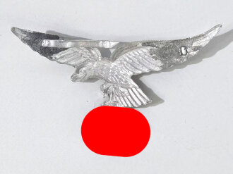 Luftwaffe, Adler für die Schirmmütze aus Aluminium, 1 Splint fehlt