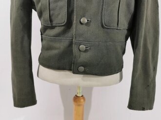 Waffen SS ?, Feldbluse für einen Offizier Modell 1944. Eigentumstück , das Innenfutter im Fischgrätmuster. Getragenes Stück, diverse kleinere Reparaturen, Mottenschäden. Kein Effektensitz erkennbar