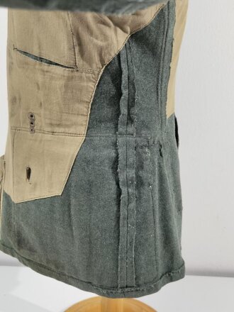 Heer, Feldbluse Modell 1936. Stärker getragenes Kammerstück mit diversen Reparaturstellen