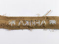 Ärmelband "Afrika" Länge 42,5 cm, getragenes Stück