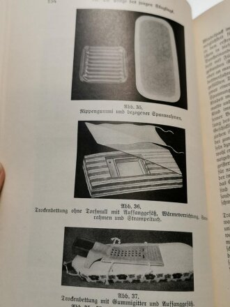 "Die deutsche Mutter und ihr erstes Kind" datiert 1934, DIN A5, gebraucht