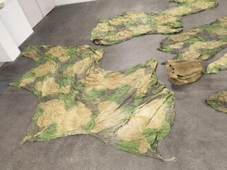 Fallschirmjäger, reste einer getarnten Fallschirmkappe in defekter Tasche