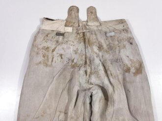 Waffen SS Wintertarnhose,. stark getragenes Stück mit vielen reparaturstellen, diese zum Teil auch neuzeitlich