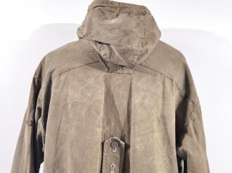 Windbluse für Gebirgsjäger der Wehrmacht . Größe II, Hersteller Mannheimer Gummistoff Fabrk Rode & Schwalenberg. Gebtragenes Stück in gutem Gesamtzustand