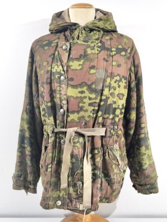 Waffen SS Winterwendejacke. Getragenes Stück mit vielen, zum Teil auch neuzeitlichen Reparaturstellen.