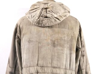 Waffen SS Winterwendejacke. Getragenes Stück mit vielen, zum Teil auch neuzeitlichen Reparaturstellen.