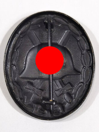 Verwundetenabzeichen in Schwarz 1939, Eisen magnetisch, ohne Hersteller, Hakenkreuz mit leichter Farbabsplitterung, sehr guter Zustand