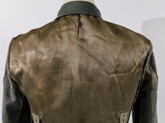 Heer, Feldbluse für Mannschaften Modell 1942. Getragenes Kammerstück mit diversen kleineren defekten. ungereinigt