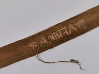 Ärmelband "Afrika" Länge 46 cm, getragenes Stück