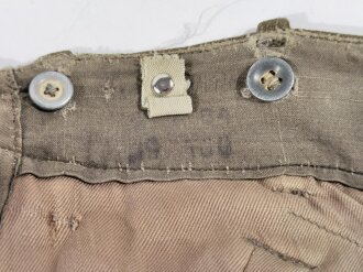 Fallschirmjäger Hose , stark getragenes Kammerstück mit diversen Reparaturstellen. Ungereinigt