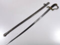 Niederlande, Löwenkopfsäbel mit Messinggefäß, vernickelte "Yzerhouwer" Klinge mit leichten Schlagspuren", Scheide mit Schlagspuren ehemals vernickelt mit einem Tragering, Klinge klemmt etwas beim Ein-und Ausziehen,