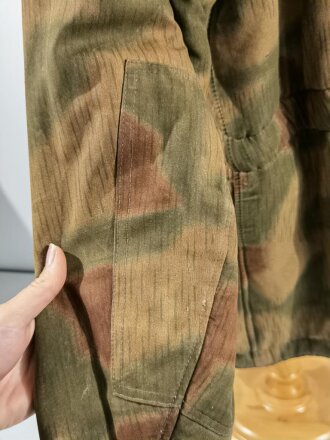 Winterwendejacke Wehrmacht, sumpftarn auf weiß. Getragenes Stück, Farbfrisch mit diversen Fehlstellen