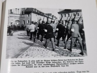 "Deutschlands Erwachen - Das Buch vom Niedergang und Aufstieg des deutschen Volkes 1918-1933" datiert 1933, 408 Seiten, über DIN A4, mit Schutzumschlag und Hülle( diese mit Wasserschaden)