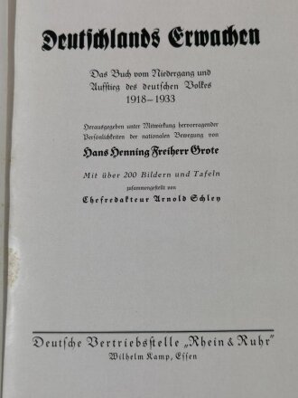 "Deutschlands Erwachen - Das Buch vom Niedergang und Aufstieg des deutschen Volkes 1918-1933" datiert 1933, 408 Seiten, über DIN A4, mit Schutzumschlag und Hülle( diese mit Wasserschaden)